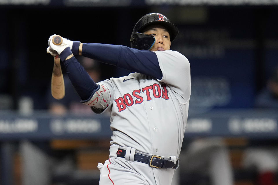 Boston Red Sox's Masataka Yoshida, of Japan, misses a pitch by Tampa Bay Rays' Aaron Civale during the fourth inning of a baseball game Monday, Sept. 4, 2023, in St. Petersburg, Fla. (AP Photo/Chris O'Meara)