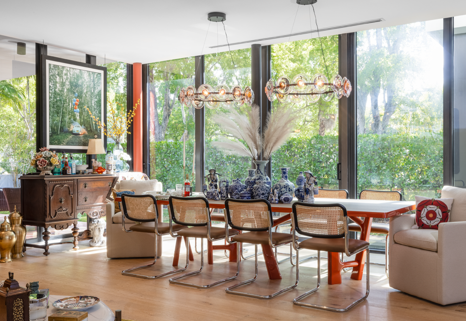 In this dining room at a Coconut Grove residence, Alex Alonso of Mr Alex Tate Design mixed his clients’ heirloom pieces with contemporary furniture to give the space an eclectic vibe.