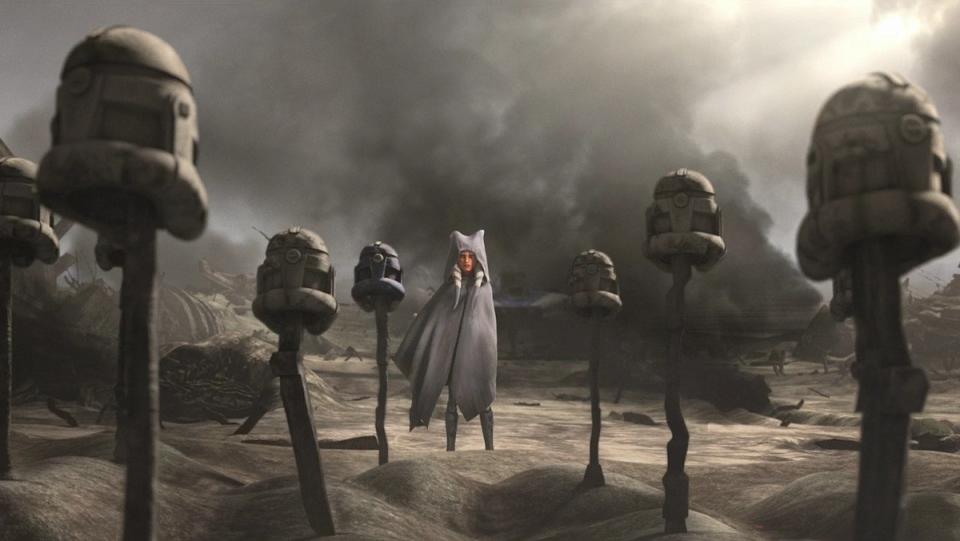 Ahsoka stands cloaked in a graveyard of clones, tombs marked with their helmets