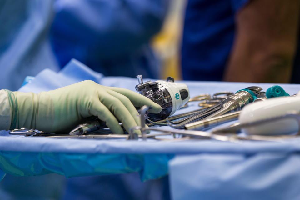 Doctors & Surgeons perform operation.