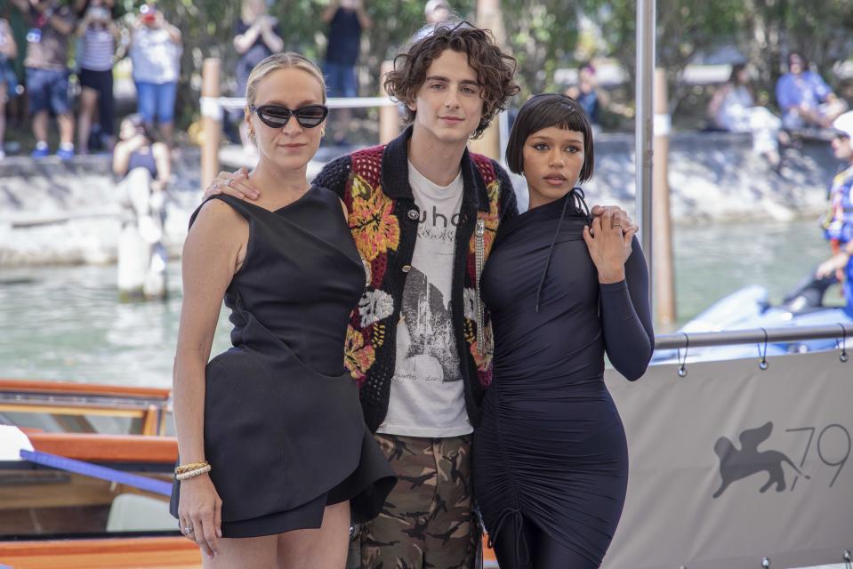 Chloe Sevigny, from left, Timothee Chalamet and Taylor Russell pose for photographers upon arrival for the photo call of the film 'Bones and All' during the 79th edition of the Venice Film Festival in Venice, Italy, Friday, Sept. 2, 2022. (Photo by Vianney Le Caer/Invision/AP)
