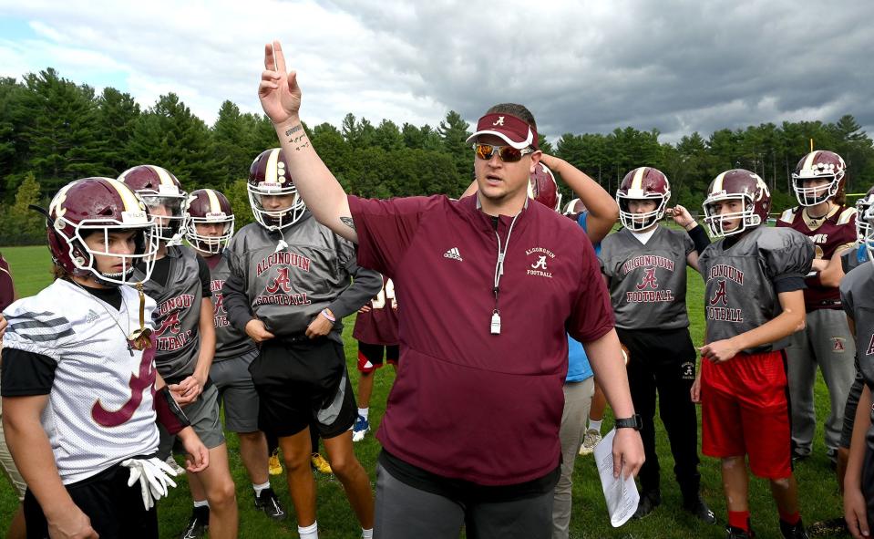 Algonquin football head coach Mark Allen talks to his players during practice, Sept. 30, 2021.  