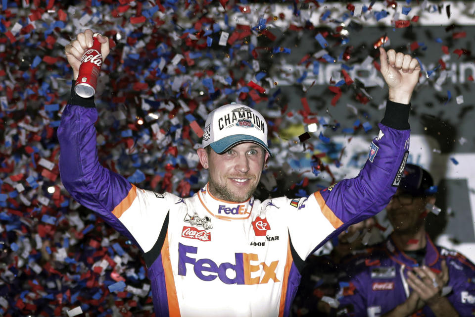 Denny Hamlin celebrates in Victory Lane after winning the NASCAR Daytona 500 auto race at Daytona International Speedway, Monday, Feb. 17, 2020, in Daytona Beach, Fla. Sunday's race was postponed because of rain. (AP Photo/John Raoux)