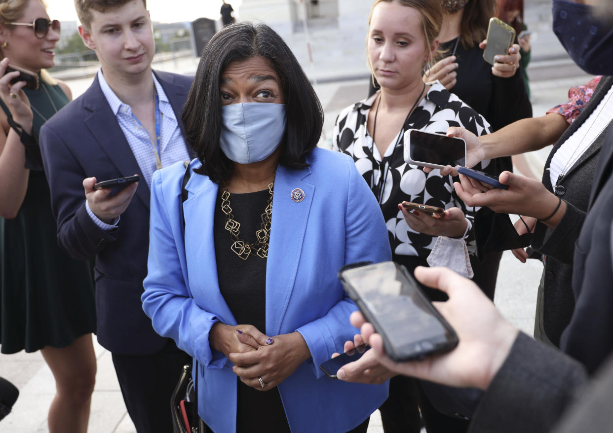 Rep. Pramila Jayapal, D-Wash., speaks to reporters as she leaves the Capitol. (Kevin Dietsch/Getty Images)
