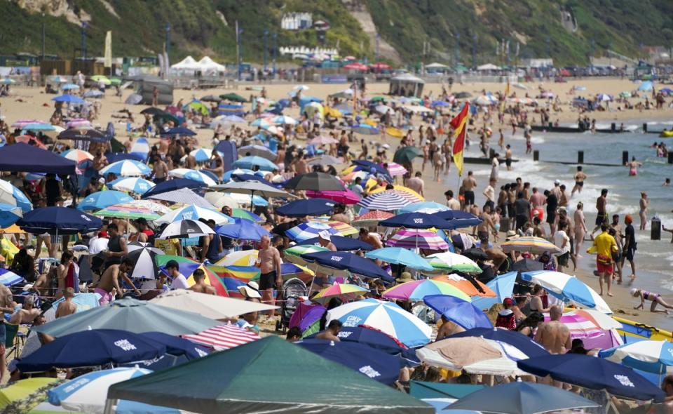 People on the beach in Bournemouth (Steve Parsons/PA) (PA Wire)