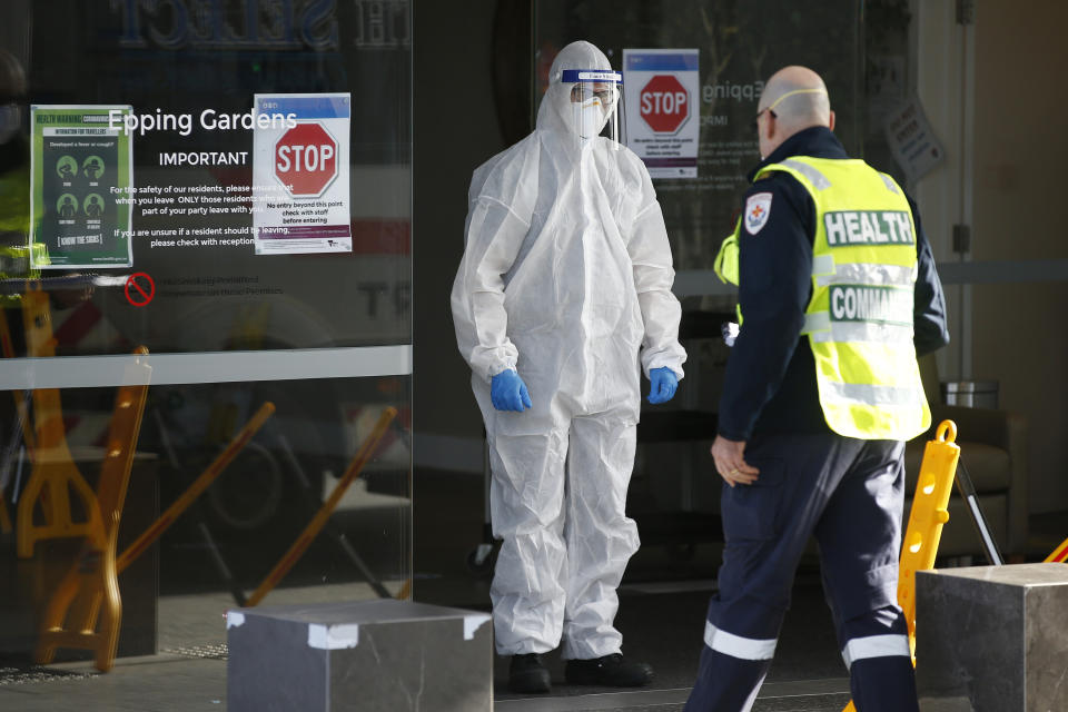 Medical staff and the health commander are seen at Epping Gardens aged care facility. Source: AAP