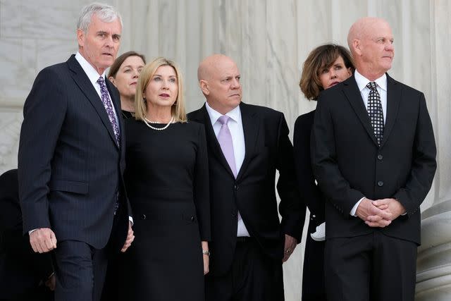 <p>Alex Brandon-Pool/Getty</p> Scott O'Connor, Jay O'Connor, and Brian O'Connor, sons of the late retired Supreme Court Justice Sandra Day O'Connor, await the arrival of her casket at the Supreme Court where she will lie in repose December 18, 2023