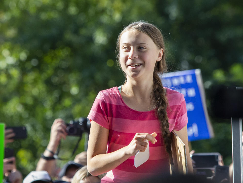 Swedish teenage climate activist Greta Thunberg arrives to the podium to speak as she takes part during the Climate Strike, Friday, Sept. 20, 2019 in New York. Tens of thousands of protesters joined rallies on Friday as a day of worldwide demonstrations calling for action against climate change began ahead of a U.N. summit in New York. (AP Photo/Eduardo Munoz Alvarez)