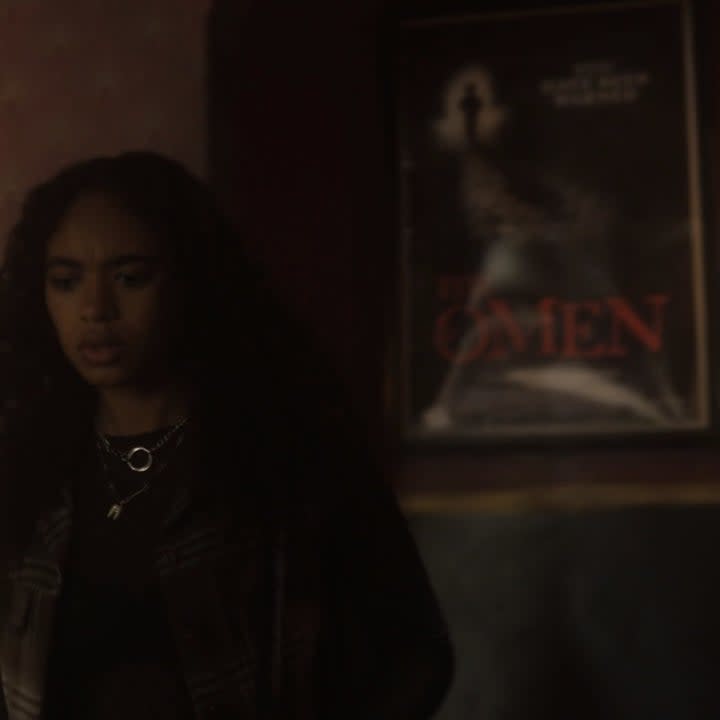 a poster for the omen in the orpheum in pretty little liars original sin