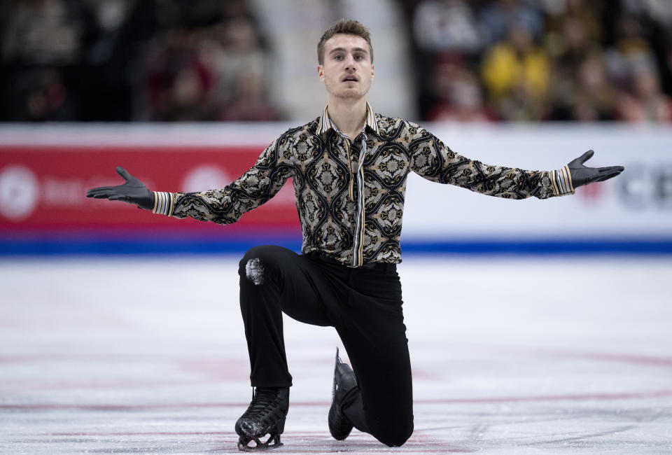 Matteo Rizzo of Italy performs his free program during the men's competition at the Skate Canada International figure skating competition in Mississauga, Ontario, on Saturday, Oct. 29, 2022. (Paul Chiasson/The Canadian Press via AP)