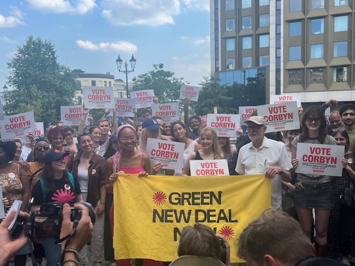 Jeremy Corbyn posing with activists from Green New Deal  (Joe Middleton)