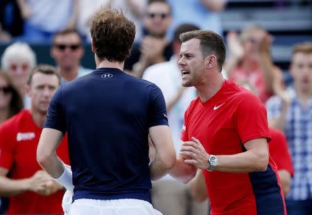 Tennis - Great Britain v France - Davis Cup World Group Quarter Final - Queen?s Club, London - 19/7/15 Great Britain's Andy Murray talks to captain Leon Smith after winning the second set of his match Action Images via Reuters / Andrew Boyers Livepic