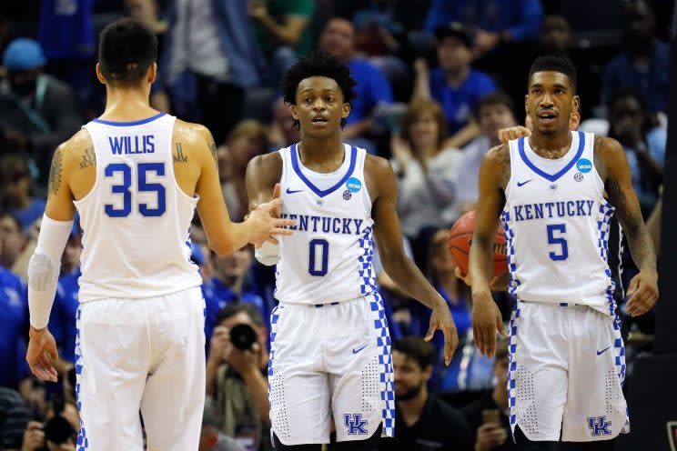 De'Aaron Fox #0 of the Kentucky Wildcats celebrates with Derek Willis #35 and Malik Monk #5 after a play in the second half against the UCLA Bruins during the 2017 NCAA Men's Basketball Tournament. (Getty)