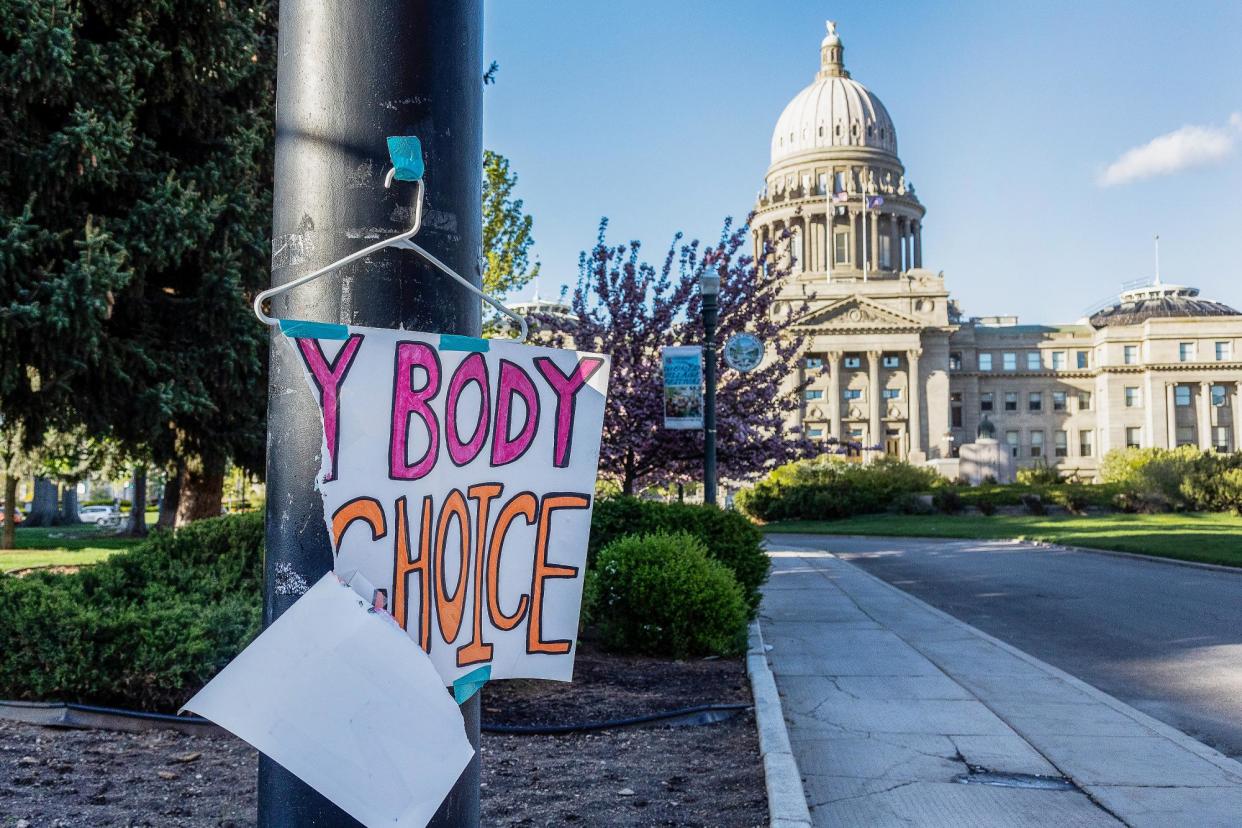 <span>A sign reading ‘My body, my choice’ is taped to a hanger near the capitol in Boise, Idaho, on 3 May 2022.</span><span>Photograph: Sarah A Miller/Idaho Statesman via AP</span>