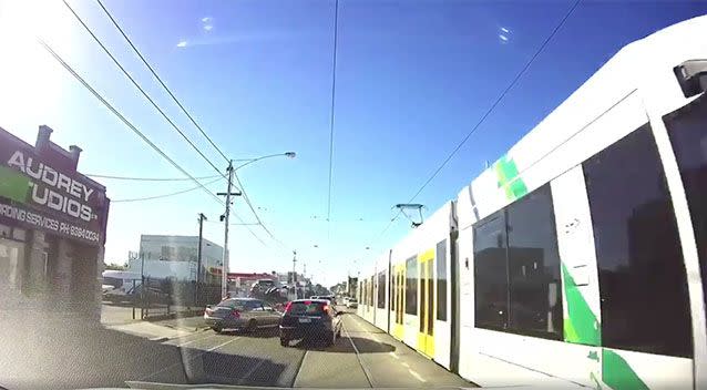 The driver reserved off the tow truck until it was flat on the ground. Source: Facebook/Dash Cam Owners Australia