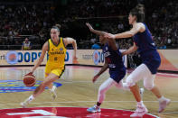 Australia's Steph Talbot runs at the Serbia defense during their game at the women's Basketball World Cup in Sydney, Australia, Sunday, Sept. 25, 2022. (AP Photo/Mark Baker)