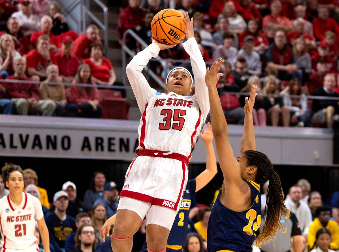 NC State’s Zoe Brooks (35) shoots over Chattanooga’s Jada Guinn (24) during the first half of their game in the first round of the NCAA Division I Women’s Basketball Championship at Reynolds Coliseum in Raleigh, NC on Saturday, March 23, 2024.