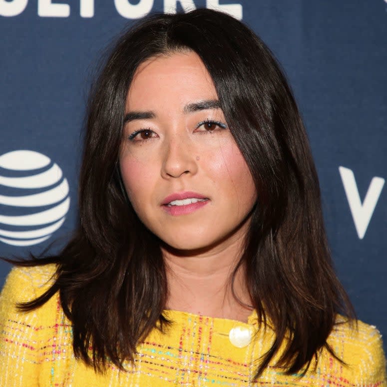 Maya Erskine in a  patterned outfit at an event