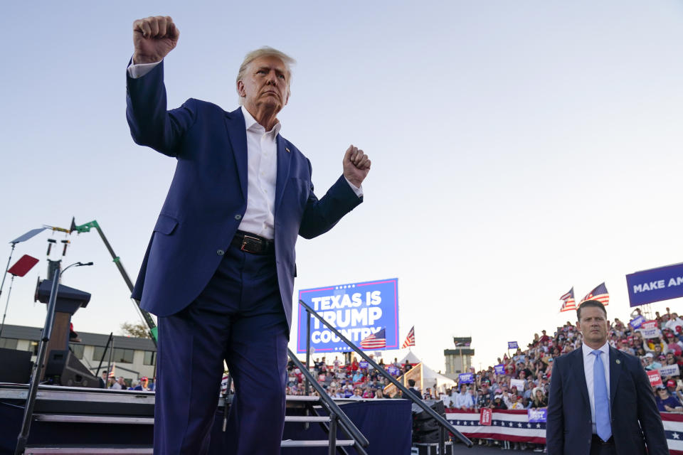 FILE - Former President Donald Trump dances during a campaign rally after speaking at Waco Regional Airport, March 25, 2023, in Waco, Texas. As Trump rails against possible indictment in New York, his team is leaning into a strategy that has quietly become a become a cornerstone of his campaign: releasing made-for-social media videos reacting to the news and outlining his agenda for a second term. (AP Photo/Evan Vucci, File)