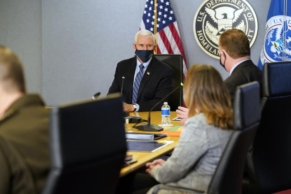 Vice President Mike Pence listens during a briefing about the upcoming presidential inauguration of President-elect Joe Biden and Vice President-elect Kamala Harris, at FEMA headquarters, Thursday, Jan. 14, 2021, in Washington. (AP Photo/Alex Brandon, Pool)