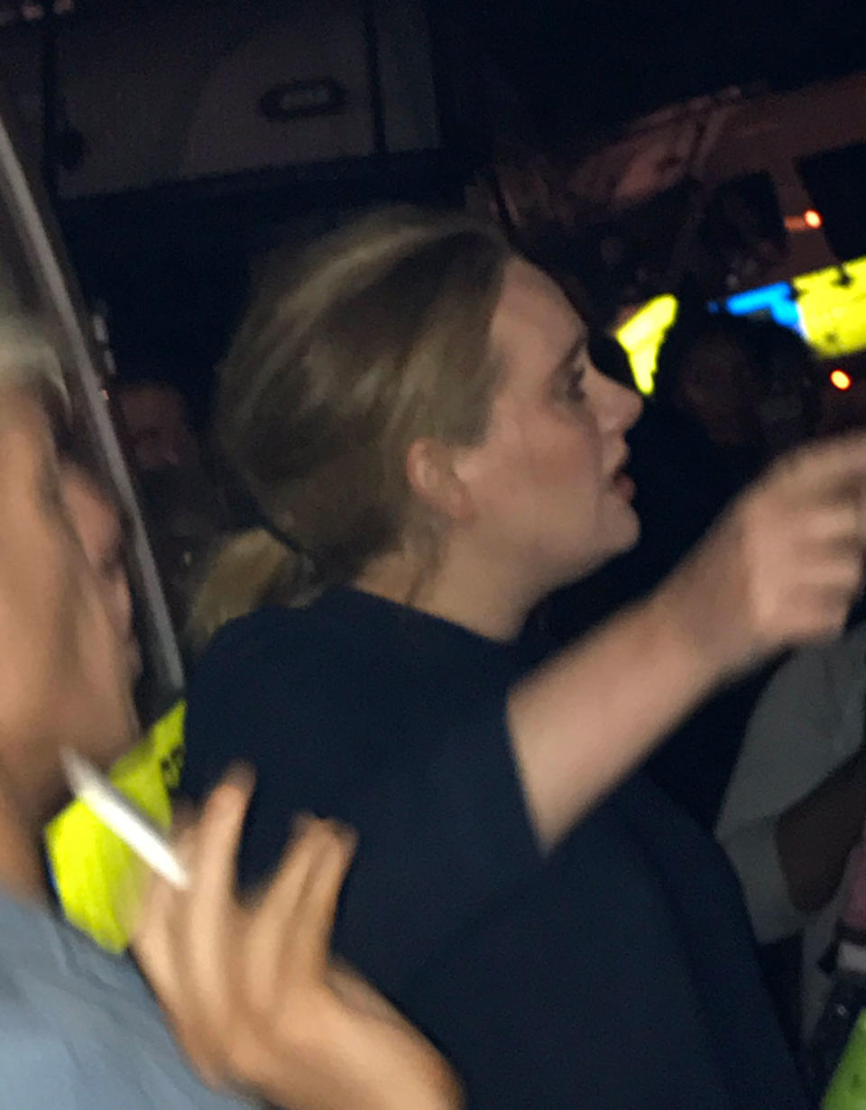 Adele Makes Emotional Visit to London's Grenfell Tower