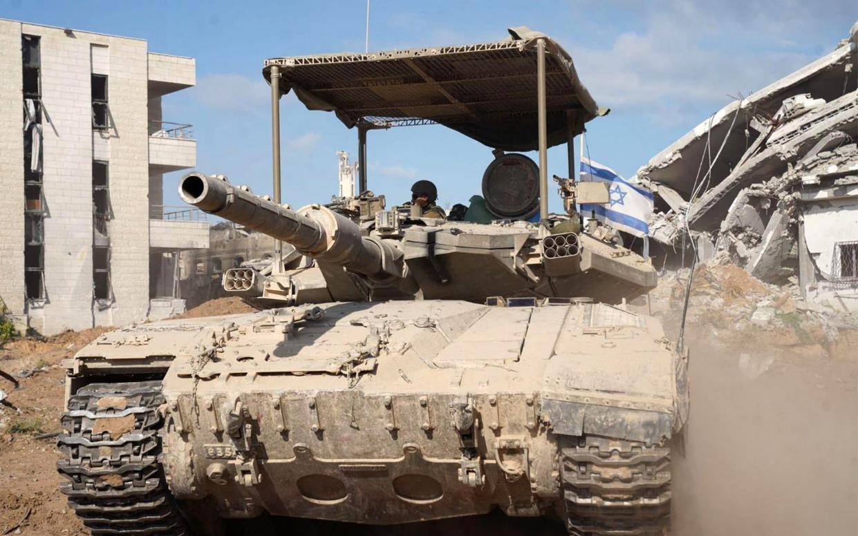 Israeli main battle tank during operations to investigate and destroy a tunnel in the central Gaza corridor