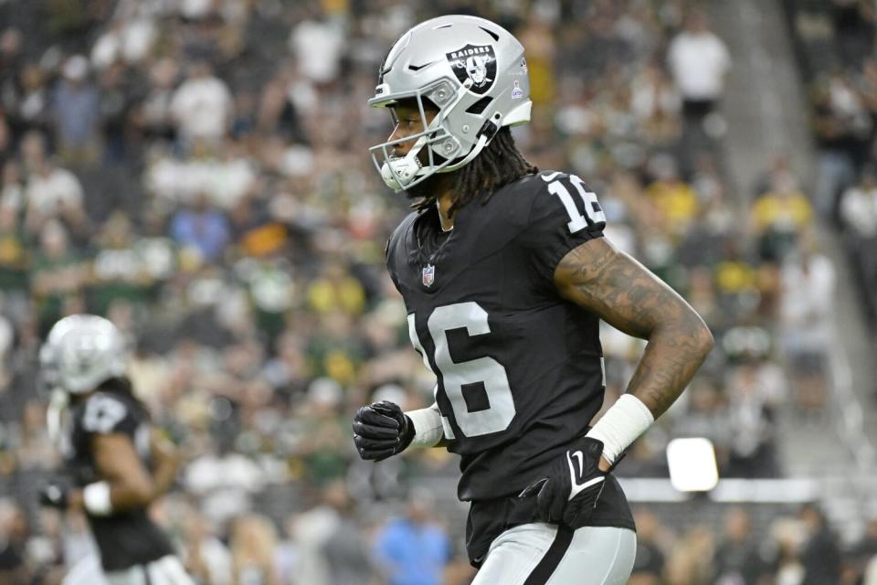 Las Vegas Raiders wide receiver Jakobi Meyers warms up before a game.