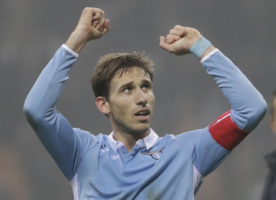 Lazio's Lucas Biglia celebrates at the end of an Italian Cup quarterfinal soccer match between Inter Milan and Lazio, at the San Siro stadium in Milan, Italy, Tuesday, Jan. 31, 2017. Lazio won 2 - 1. (AP Photo/Luca Bruno)