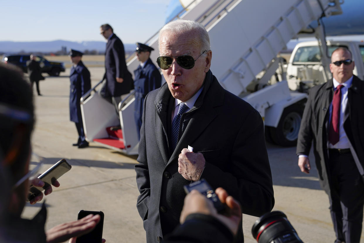 President Joe Biden speaks with members of the press after stepping off Air Force One at Hagerstown Regional Airport in Hagerstown, Md., Saturday, Feb. 4, 2023, en route to Camp David for the weekend. (AP Photo/Patrick Semansky)