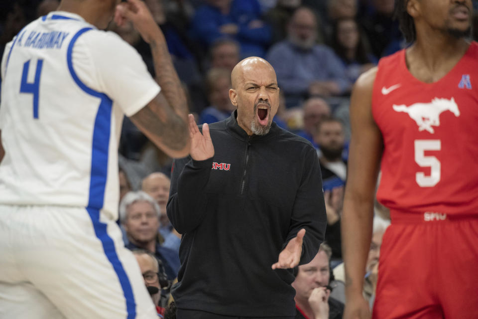 SMU head coach Rob Lanier instructs his team during the first half of an NCAA college basketball game Sunday, Jan. 7, 2024, in Memphis, Tenn. (AP Photo/Nikki Boertman)