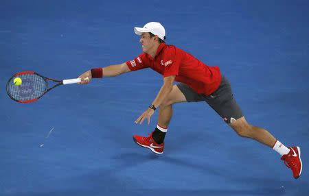 Tennis - Australian Open - Melbourne Park, Melbourne, Australia - 22/1/17 Japan's Kei Nishikori hits a shot during his Men's singles fourth round match against Switzerland's Roger Federer. REUTERS/Jason Reed