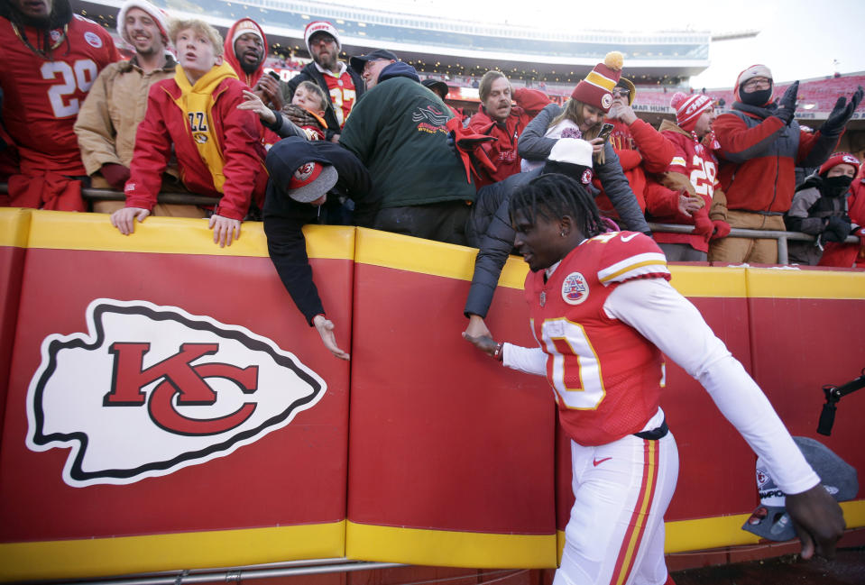 Kansas City Chiefs wide receiver Tyreek Hill (10) takes leave of fans following an NFL football game against the Miami Dolphins in Kansas City, Mo., Sunday, Dec. 24, 2017. (AP Photo/Charlie Riedel)