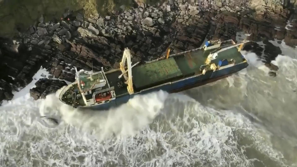 Undated image released Monday Feb. 17, 2020, by Irish Coast Guard showing an abandoned cargo ship the MV Alta, that has washed up on the coast of County Cork, near Ballycotton, southern Ireland. The MV Alta is believed to have had 10 crew members aboard who were rescued by the US Coast Guard. Since September 2018, the ship has been drifting with no crew aboard, and it was last seen off the coast of West Africa before being washed up in southern Ireland during Storm Dennis. (Irish Coast Guard via AP)