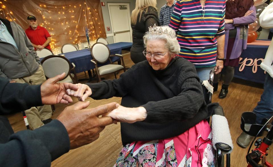 Lorene Summey has the first dance with Ronnie Parks during her 105th birthday party Friday evening, Nov. 18, 2022, at Somerset Court of Cherryville.