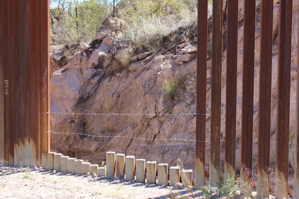 Gaps in the border wall are pictured near Sasabe on Friday, October 13, 2023.