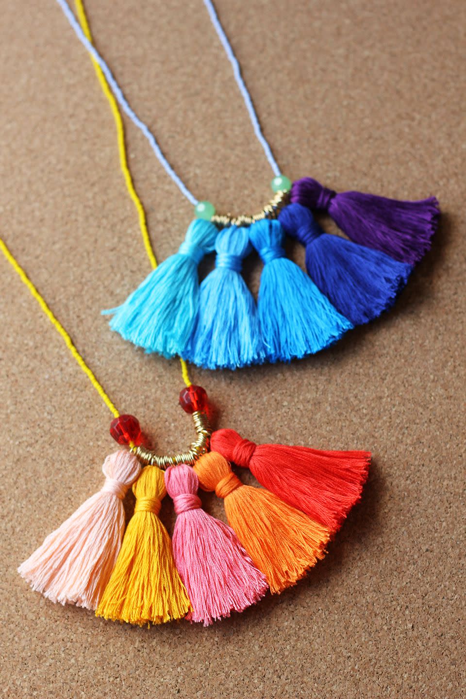 <p>Make a statement with a colorful accessory that's party-ready. This blogger recommends using a needle to comb through the tassels after wearing to keep them neat and full. </p><p><em><a href="http://www.homemadebanana.com/diy-ombre-tassel-necklace/" rel="nofollow noopener" target="_blank" data-ylk="slk:Get the tutorial at Homemade Banana »;elm:context_link;itc:0;sec:content-canvas" class="link ">Get the tutorial at Homemade Banana »</a></em><br></p>