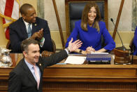 FILE - This Wednesday Jan. 8, 2020 file photo shows Virginia Gov. Ralph Northam, bottom left, as he recognizes House speaker, Eileen Filler-Corn, D-Farifax, right, while he prepares to deliver his State of the Commonwealth address as Lt. gov. Justin Fairfax, top left, applauds before a joint session of the Virginia Assembly at the Virginia state Capitol in Richmond, Va. (AP Photo/Steve Helber)