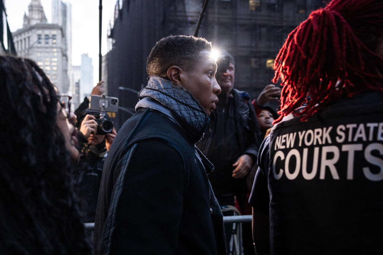 Jonathan Majors leaves a courthouse after being found guilty of assault and harassment.