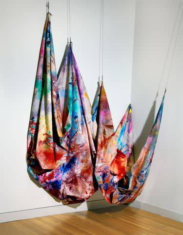 <p>Courtesy of The Smithsonian American Art Museum</p> Sam Gilliam, Swing, 1969, acrylic and aluminum on canvas, 119 5â„8 x 283 1â„2 in. (303.8 x 720.1 cm), Smithsonian American Art Museum, Gift of Mr. Edwin Janss, Jr., 1973.189