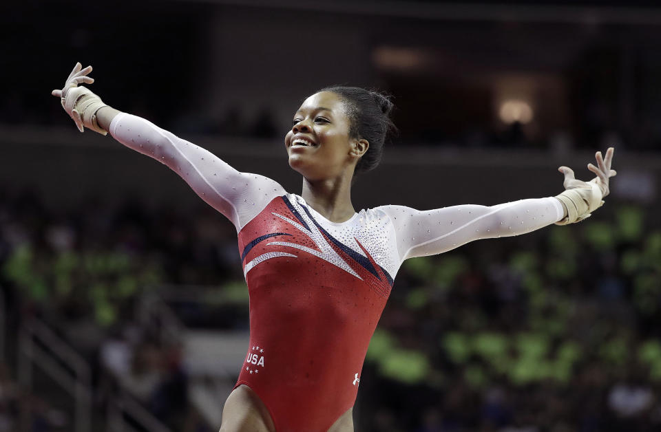 FILE - Gabrielle Douglas smiles after competing on the floor exercise during the women's U.S. Olympic gymnastics trials in San Jose, Calif., Sunday, July 10, 2016. USA Gymnastics has accepted a petition from the 28-year-old Douglas to compete at both the U.S. Classic in Hartford, Connecticut and the American Classic in Katy, Texas scheduled for later this month. (AP Photo/Gregory Bull, File)