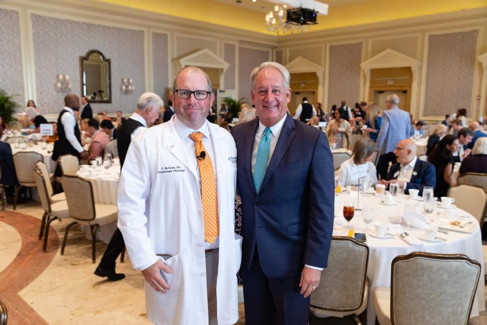 Dr. Christopher McCann, left, with Palm Beach Chamber of Commerce CEO Doug Evans, was the guest speaker at Wednesday's Chamber breakfast at The Breakers. McCann, a board-certified gynecologic oncologist, spoke about the use of robotic technology in surgical procedures.