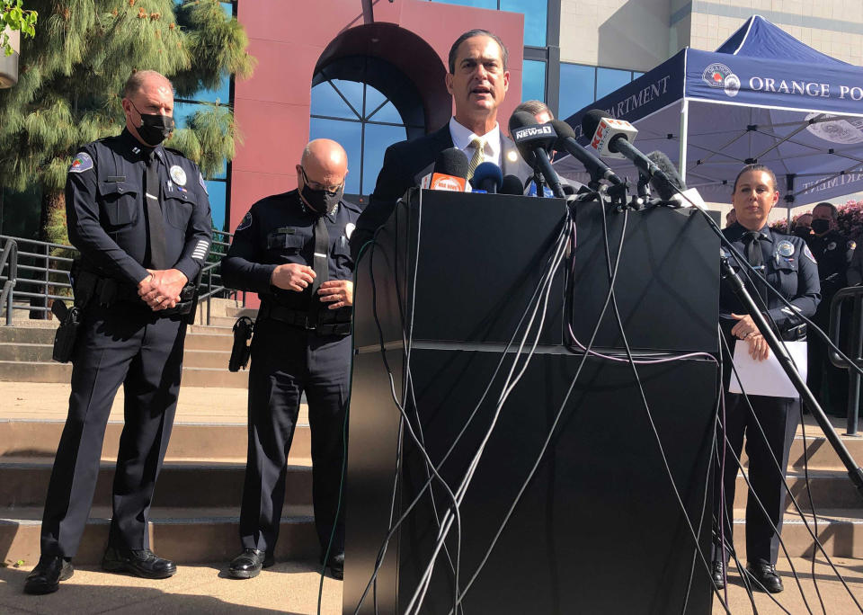 Orange County District Attorney Todd Spitzer talks during a news conference at the Orange Police Department headquarters in Orange, Calif., Thursday, April 1, 2021. A child was among four people killed Wednesday in a shooting at a Southern California office building that left a fifth victim wounded and the gunman critically injured, police said. (AP Photo/Stefanie Dazio)