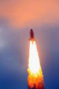 NASA space shuttle Endeavour lifts off from Launch Pad 39A at the Kennedy Space Center on May 16, 2011 in Cape Canaveral, Florida. After 20 years, 25 missions and more than 115 million miles in space, Endeavour is on its final flight to the International Space Station before being retired and donated to the California Science Center in Los Angeles. Capt. Mark E. Kelly, Gabrielle Giffords’s husband, will lead mission STS-134 as it delivers the Express Logistics Carrier-3 (ELC-3) and the Alpha Magnetic Spectrometer (AMS-2) to the International Space Station. (Photo by Joe Raedle/Getty Images)