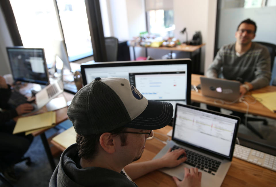 BOSTON - MARCH 19: WeWork is a company that offers entrepreneurs and small businesses workspace in a collaborative community, connective technology and other services. Zefr employee Doug Hogan at the company's Boston WeWork location. (Photo by Jonathan Wiggs/The Boston Globe via Getty Images)