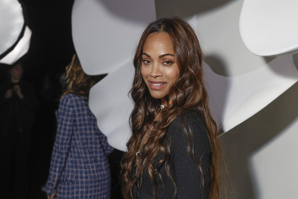 Zoe Saldana attends the Chanel Fall/Winter 2023-2024 ready-to-wear collection presented Tuesday, March 7, 2023 in Paris. (Vianney Le Caer/Invision/AP)