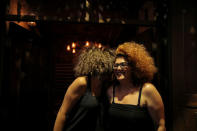 Two women talk to each other in a bar in the Old City of Damascus, Syria, September 13, 2018. REUTERS/Marko Djurica/Files