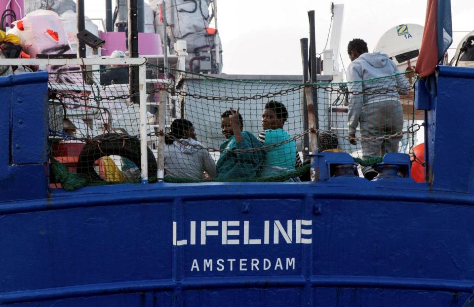 Ship: Migrants are seen on the deck of the Mission Lifeline rescue boat (REUTERS)