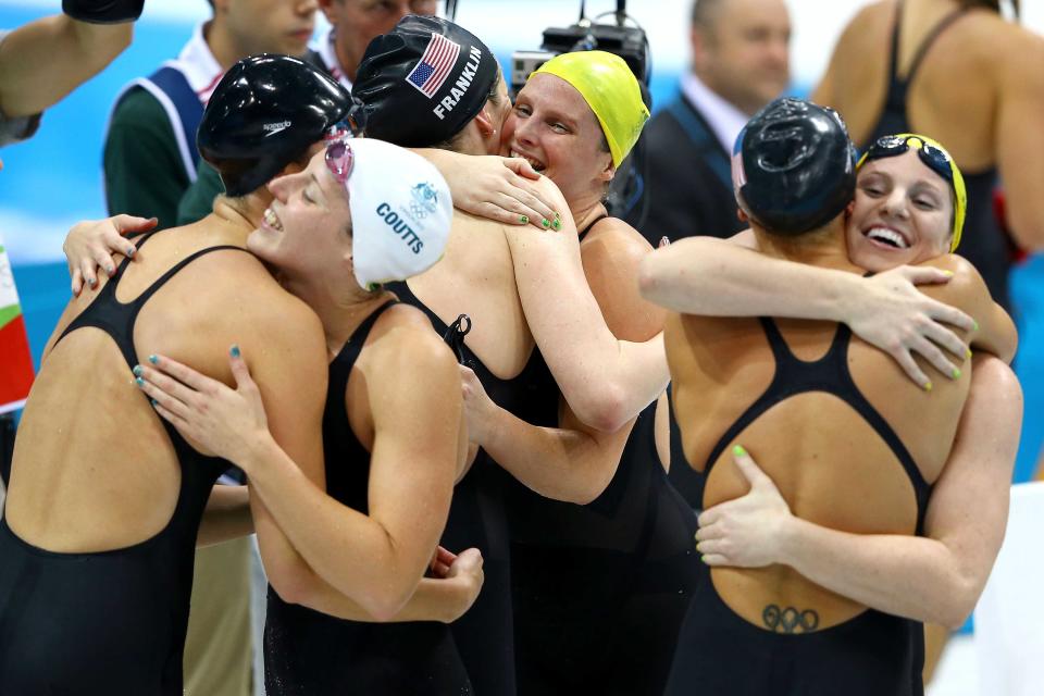 Dana Vollmer of the United States, Alicia Coutts of Australia, Missy Franklin of the United States, Leisel Jones of Australia, Allison Schmitt of the United States and Emily Seebohm of Australia congratulate each other following the Women's 4x100m Medley Relay on Day 8 of the London 2012 Olympic Games at the Aquatics Centre on August 4, 2012 in London, England. (Photo by Al Bello/Getty Images)