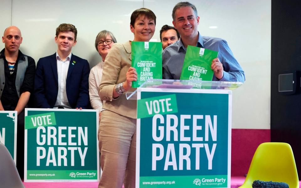 Britain's Green Party co-leaders Caroline Lucas (L) and Jonathan Bartley pose during the Green Party launch