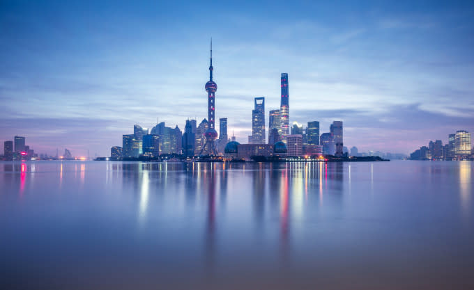 Lujiazui financial district in Shanghai at dusk , China , Asia